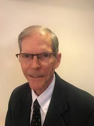 What causes a Massey Ferguson 124 baler to randomly trip and start tying?