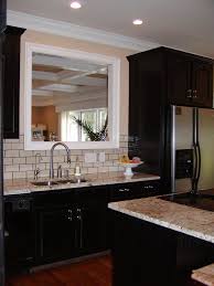 Dramatic Black In The Kitchen Before And After Espresso Kitchen Cabinets Espresso Cabinets Backsplash With Dark Cabinets