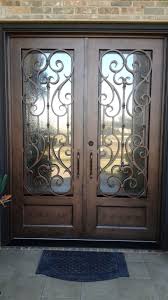 Also, this style of the entrance doors is elegant and shows that homeowners have an excellent taste. Custom Wrought Iron Double Door Aaleadedglass Com Double Door Entrance Iron Doors Wrought Iron Doors