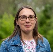 Implications of Artificial Intelligence-Related Data Center Electricity Use  and Emissions: A Workshop