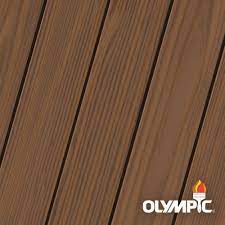 Apply either type with a pump sprayer, the ideal tool for coating the long runs and numerous nooks and crannies of a fence. Olympic Maximum 1 Gal Walnut Semi Transparent Exterior Stain And Sealant In One Low Voc Oly708 01 The Home Depot