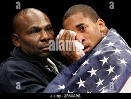 Demetrius Andrade, right, of the United States, and his coach look at the  referee after Andrade Adem Kilicci of Turkey, in the Welterweight  69-kilogram class during the semifinals of the World Boxing Championships  in Chicago, Friday, Nov. 2, 2007. Andrade ...