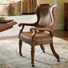 Browse side and arm chairs in a full range of beautiful leather shades, including sienna brown, gray, red, white, black, chocolate brown and more. Dining Chairs With Casters You Ll Love In 2021 Visualhunt
