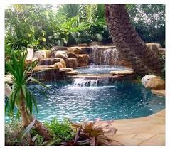 Top 60 Best Pool Waterfall Ideas Cascading Water Features Cool Pool Features Coolpoolfeatures From Na Pool Waterfall Backyard Pool Landscaping Cool Pools