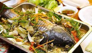 Những lá cờ koi (cá chép) vải đầy màu sắc được treo trên mái nhà hoặc hành lang chung cư của các gia đình có con trai. Cong Thá»©c Chuáº©n Cho Mon Ca Chep Om DÆ°a ThÆ¡m Ngon áº©m Thá»±c Thong Thai