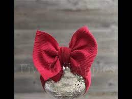 Learn how to make bow head wraps for babies with our tutorial! How To Tie A Headwrap Bow Youtube Diy Baby Bows Headbands Diy Baby Bows Diy Baby Hair Bows