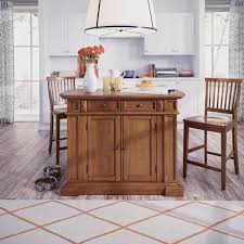 Bobs furniture kitchen island 463277 collection of interior design and decorating ideas on the littlefishphilly.com. Homestyles Woodbridge 3 Piece Brown Kitchen Island Set 5010 948 Bob Mills Furniture Tx Ok