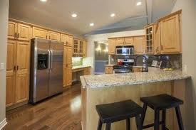Grandville Executive Ranch Remodel And Stage Transitional Kitchen Grand Rapids By At Home Design A Maple Cabinets Accessible Beige Transitional Kitchen