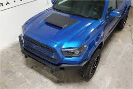 I questioned the owner via email as to why it doesnt have a hood scoop. Toyota Tacoma Hood Decal Toyota Tacoma