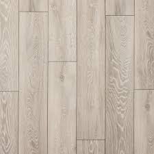 Affordable and dependable, laminate flooring from floor & decor can withstand heavy foot traffic with minimal wear and tear, looking just as good as new even after years of use. Beachcomber Oak Water Resistant Laminate Flooring Wood Floor Texture Laminate Flooring