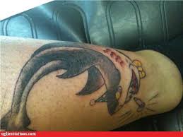 They also symbolize the defense and protection of a family. Ugliest Tattoos Sharks Bad Tattoos Of Horrible Fail Situations That Are Permanent And On Your Body Funny Tattoos Bad Tattoos Horrible Tattoos Tattoo Fail Cheezburger