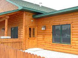 The doors are placed into the door opening on completion of the build and the door trims/fascias added once it is in place]. Pine Cedar Trim Log Cabin Trim Woodworkers Shoppe