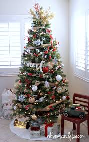 The season has just tu. Trimming The Christmas Tree 99 Cents Only Style