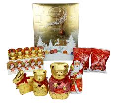 The only drawback about getting a box of chocolates—even if it's a very expensive, pretty box—is that once it's opened, you're often looking at a grid. Lindt Chocolate Hamper 12 Days Of Xmas 2016 Babes About Town