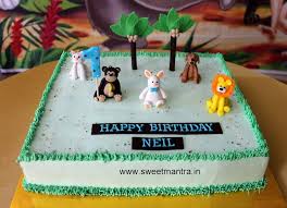 Baby Boy 1st Birthday Cake Cartoon Images Animals Theme Sheet Cake For 1st Birthday By Sweet Mantra Customized 3d Cakes Designer Wedding Engagement Cake Sheet Cake Cartoon Birthday Cake Cake Delivery