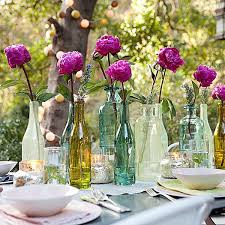 A large crystal footed bowl is the centerpiece of this table, filled with red roses. Dinner Party Table Setting Ideas Dinner Party Table Settings Dinner Party Table Wedding Reception Centerpieces Diy
