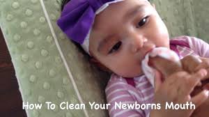After cleaning the tongue, rotate the finger around and massage cheeks sides, gums and teeth gently. How To Clean Your Newborns Mouth Youtube