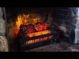 An electric fireplace insert is placed inside an existing fireplace, wall, mantel or entertainment center to provide the experience of having a real fire without many of the downsides. Electric Log Heater Fireplace Insert Electric Fireplaces Stoves Electric Fireplace Logs Fireplace Inserts Fireplace Logs