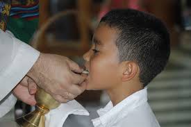 What are the current rules for determining the age of reason for first holy  Communion? | Simply Catholic