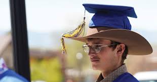 Graduates add their taste of style to caps
