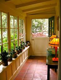 All decks that are raised off the ground must have a railing to shield everybody safe from falling. Delightful Green Plants Pottery On Windows Shelves As Well As Antique Shade Table Lamps As Decorate In Small House With Porch Small Covered Patio Porch Design