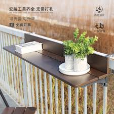 You can create an inviting balcony space with a few simple pieces and a little imagination. Balcony Railing Hanging Table Bar Table Household Multifunctional Hanging Outdoor Tea Table Balcony Leisure Table Folding