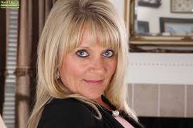 Older blonde housewife Aubrey Adams peels off pantyhose to get totally  naked - Pichunter