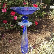 I Call This Item Blue Swirl It Is Made With Repurposed Glass Items It Can Be Used As A Birdbath Bird Feeder Glass Garden Art Garden Totems Recycled Yard Art