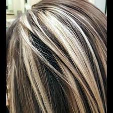 This tousled mane of hair makes the most of its natural thickness by placing perfect golden highlights starting at the crown and working down in artful balayage strokes. Pin By Kristen Conant Hart On Hairstyles Hair Styles Dark Brown Hair With Blonde Highlights Dark Hair With Highlights