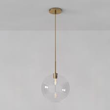 E modern chandelier w/ glass shades e 7 globe lights provide a warm, radiant glow e adjustable pendant poles offer up to 3.5 ft. Sculptural Glass Globe Pendant Light Clear 14