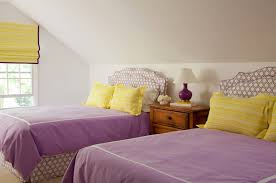 Modern furniture and geometric touches will keep a teen's pink bedroom from looking too young or frilly. Purple And Yellow Girls Bedroom Cottage Girl S Room Amanda Nisbet Design