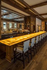 onyx caramello backlit bar at the grove aria stone gallery in 2021 stone gallery kitchen marble feature wall