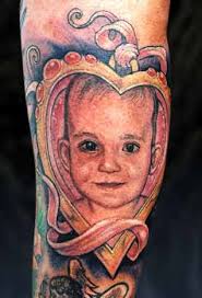 Baby in a Heart by Guy Aitchison: TattooNOW