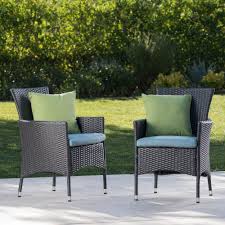 Noble House Malta Gray Wicker Outdoor Dining Chairs With Teal Cushions 2 Pack 21107 The Home Depot Patio Dining Chairs Outdoor Dining Chairs Wicker Dining Chairs