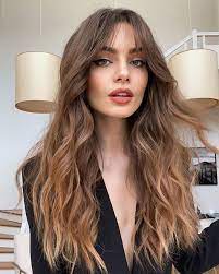 Raise your hand if you're a bit of a scaredy cat and always end up saying, just the usual, when you really want a shaggy bob. Curtain Fringe Trend What You Need To Know Marie Claire Australia