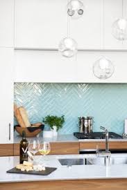 Glass tile installed on a kitchen backsplash using a high polymer content thinset suitable for glass tile. Best 60 Modern Kitchen Glass Tile Backsplashes Design Photos And Dwell