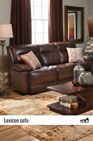 Lexicon Reclining Sofa Is Made Of Breathable Easy Clean Leathaire In Chocolate Brown Rowe Furniture Reclining Sofa Decor Reclining Sofa