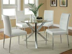 For a sleek, modern appearance, try a glass top dining room set with a clear pane resting on a metal base. 39 Glass Dining Tables Ideas Contemporary Glass Dining Table Dining Room Sets Glass Dining Table