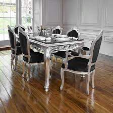 On the island and throughout the kitchen, intricately carved pilasters, plinths and other architectural elements pay homage to the. Rococo Silver Leaf French Style Dining Table Dining Room Design Dining Table French Dining Tables