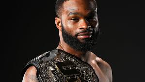 Belt in hand, the real work begins for Woodley
