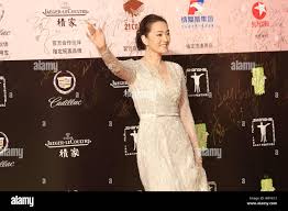 Chinese actress Gong Li waves on the red carpet for the opening ceremony of  the 17th Shanghai International Film Festival in Shanghai, China, 14 June  Stock Photo - Alamy