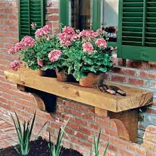 Check spelling or type a new query. Here S A Clever Twist On The Classic Window Box A Wood Shelf That Displays Plants Right In Their Pots Outside Yo Window Box Window Planters Window Box Flowers