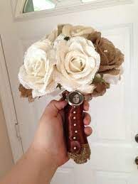 Adorn your beautiful blooms with personalized bling that could be the perfect 'something blue' wrap your new 'bouquet bracelet' either once, twice or three times around the base of your bouquet! My Burlap Wedding Bouquet Bought Most Of My Supplies From Hobby Lobby And The Charm From Michaels I Wedding Bouquets Burlap Wedding Burlap Bouquet Wedding