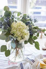 And if you have any leafy greens, they go in last. Diy Flower Arrangement Under 40 The Fox She
