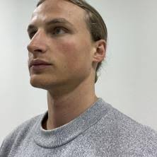 Avat3r: Large Animatable Gaussian Reconstruction Model for High-fidelity 3D  Head Avatars