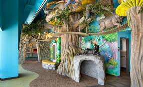 Interior Design And Decor Of A Jungle Hideaway In Themed Dental Office By Imagination Dental Solutions Dentist Office Design Dental Office Design Dental Office