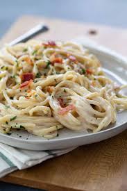 I served it with cut up grilled chicken and fettucine. Simple Alfredo Pasta With Bacon Perfect For Date Night Taste And Tell