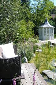 Garten Inspiration Gartenhaus Mit Passender Terrasse Und Sitzgelegenheit Garten Design Gartengestaltung Garten