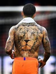 Memphis in an interview said that he relates to the animal and qualities that it represents. Memphis Depay Tattoo Cost