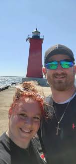 American Lighthouse Surrounded by Lush Greenery